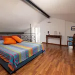 La Mela - De Vivo Realty